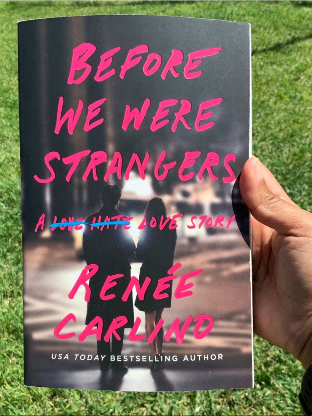 Before We Were Strangers by Rene Carlino paperback book.